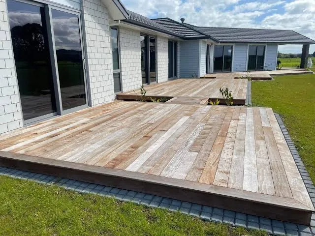 New wooden deck outside modern home